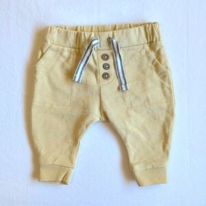 anko soft yellow cotton joggers size newborn baby